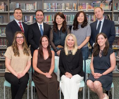 Carol Cheng (Top C.) and Lisa Coscia (Bottom Far L.) were sworn onto the Syosset Board of Education as president and vice president, respectively.