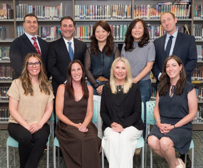 Carol Cheng (Top C.) and Lisa Coscia (Bottom Far L.) were sworn onto the Syosset Board of Education as president and vice president, respectively.