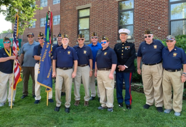 The Syosset VFW Post 6394 marches in the Oyster Bay Fire Department's 4th of July parade