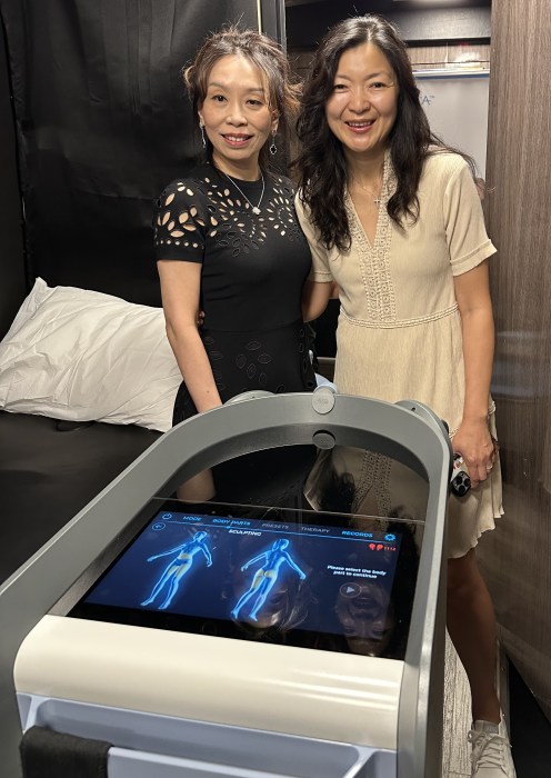 Vibrance 360’s founder and medical director, Helen Hsieh and Council Member Christine Liu inside the bus.